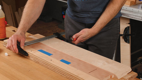 Wide plywood cauls even out clamping pressure.